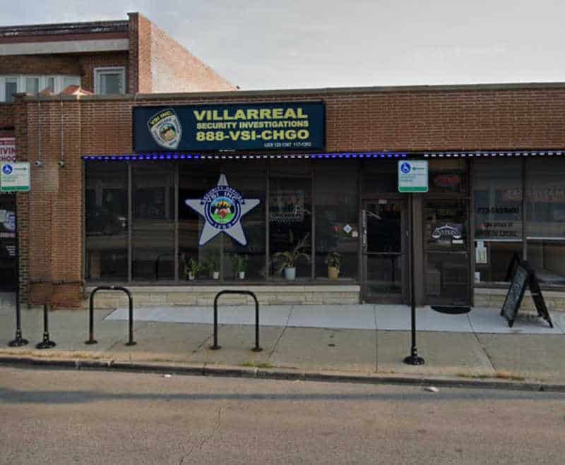 The exterior of Villarreal Security Investigations' office in Chicago, featuring signage with contact information, representing a trusted provider of professional security services for businesses and communities.